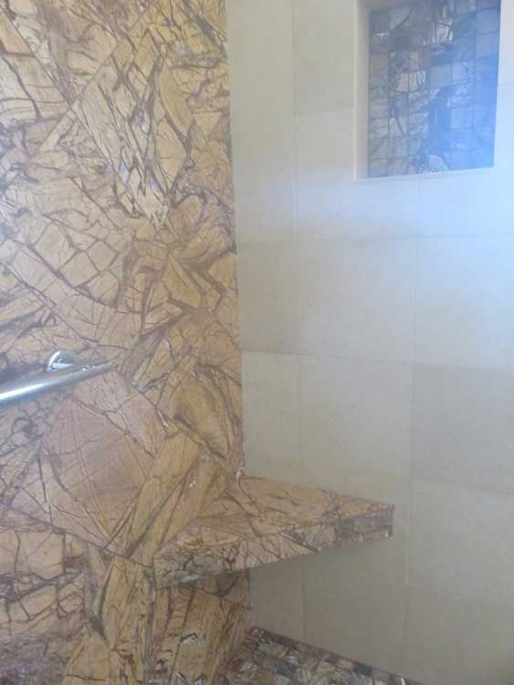 Marin County bathroom by Miconi Marble & Tile — walk-in shower with tile bench (project 16)