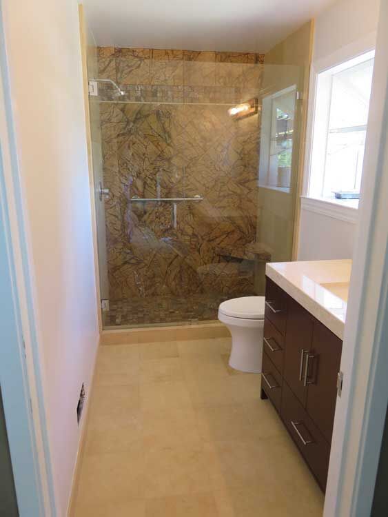 Marin County bathroom by Miconi Marble & Tile — frameless glass shower with stone (project 9)